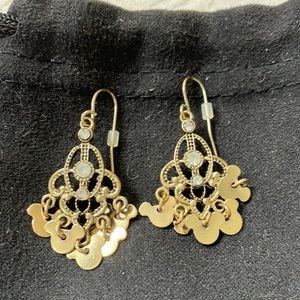 Disney chic chandelier style hook earrings w/ 3 sparkle stone inserts. Gold tone